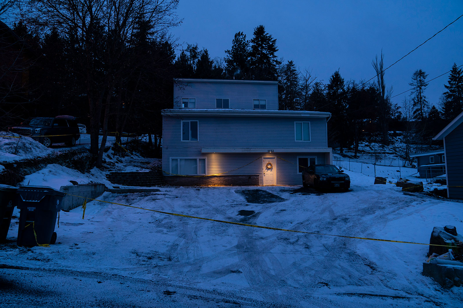 Police tape surrounds a home that was the site of a quadruple murder on January 3 in Moscow, Idaho. 