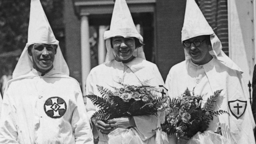 A Ku Klux Klan wedding in Washington DC, during the mass Klan demonstration, 1925. From left to right, Carson Sanders (the best man), Mr and Mrs Charles E. Harris (the bride and groom), Miss Dorothy Lucas (sister of the bride) and Reverend Carroll Maddox of the First MP Church of Washington. (Photo by FPG/Hulton Archive/Getty Images)